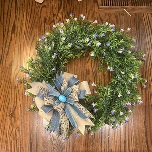 Handcrafted Greenery Wreath with Blue Ribbon Accent